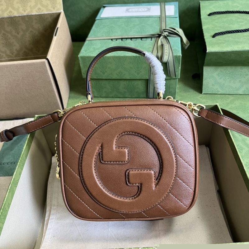G*u*i top handle bags